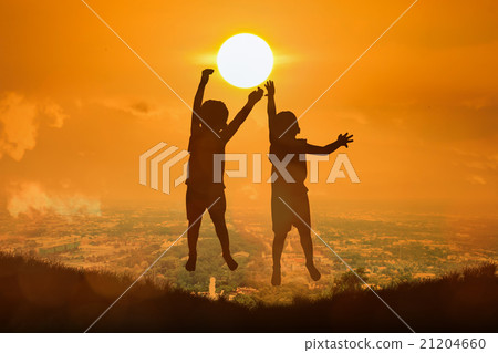 boy happy jumping touch the sun boy happy jumping touch the sun 21204660