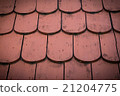 Weathered red wood roof 21204775