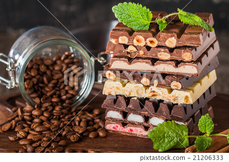 An assortment of white, dark, and milk chocolate An assortment of white, dark, and milk chocolate 21206333