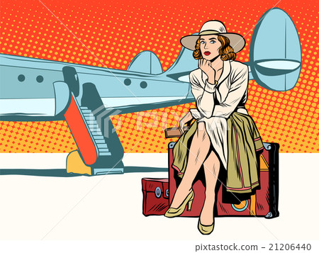 Tourist girl sitting on a suitcase, travelling by 21206440