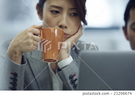 A woman with a cup A woman with a cup 21206674
