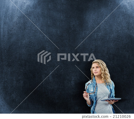 Composite image of woman holding eyeglasses and digital tablet Composite image of woman holding eyeglasses and digital tablet 21210026