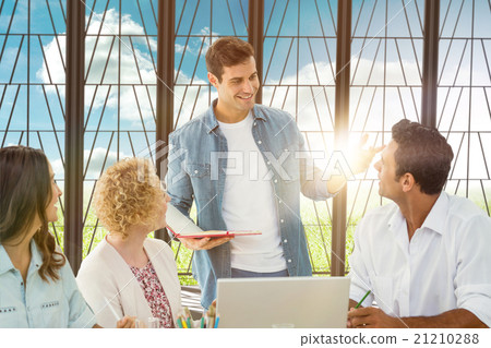 Composite image of group of young colleagues in a meeting Composite image of group of young colleagues in a meeting 21210288