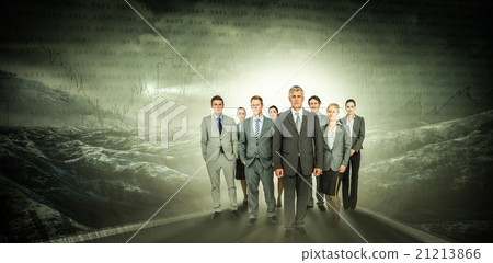 Composite image of smiling business team looking at camera Composite image of smiling business team looking at camera 21213866
