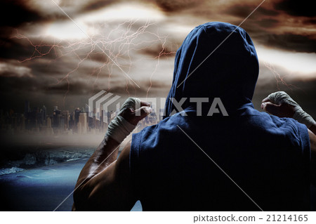 Composite image of rear view of athlete with arms raised 21214165