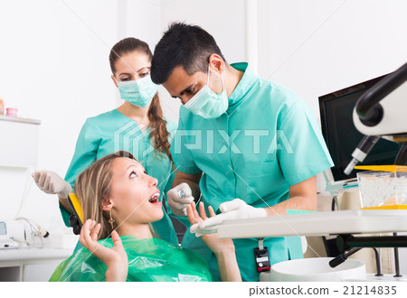 doctor and frightened patient at clinic 21214835