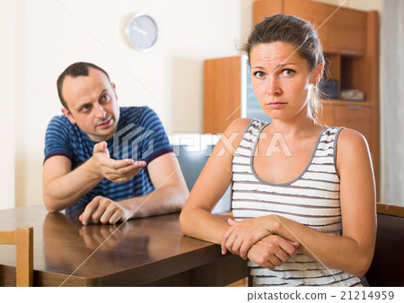 wife and furious husband discussing divorce 21214959