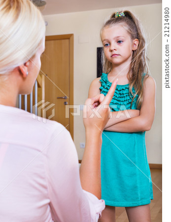 Nanny scolding at little girl Nanny scolding at little girl 21214980