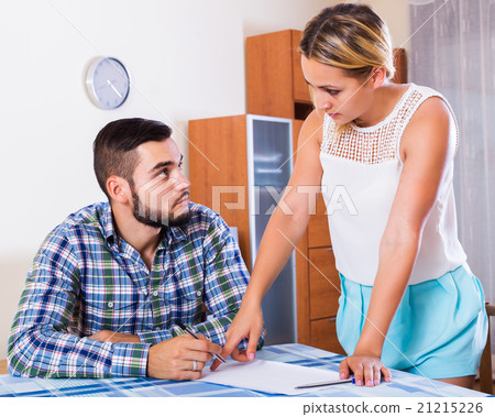 Couple discussing serious financial situation Couple discussing serious financial situation 21215226
