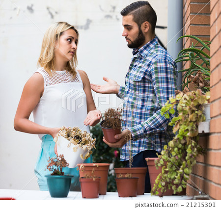 wife in shock of husband and shrunken plants wife in shock of husband and shrunken plants 21215301