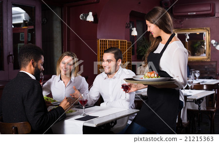 chatting adults and cheerful waitress 21215363