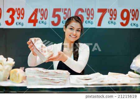 Portrait of female seller offering salo and lard Portrait of female seller offering salo and lard 21215619