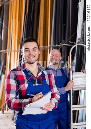Worker at factory with boss Worker at factory with boss 21216172