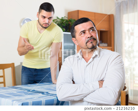 Two serious men having conflict 21216210