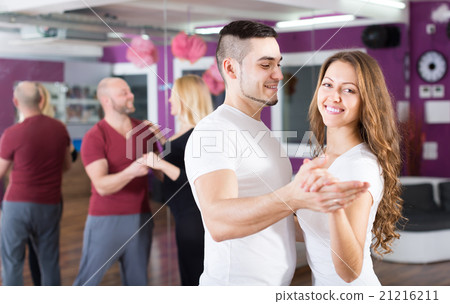 Group dancing in club 21216211