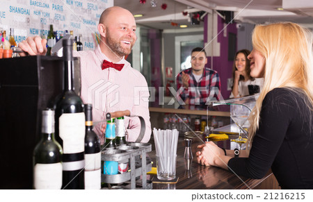 Friends drinking and chatting 21216215
