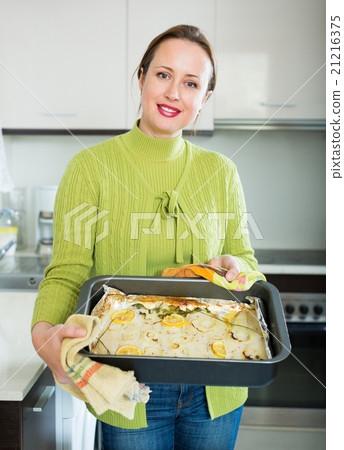 woman preparing fish woman preparing fish 21216375