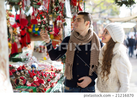 Happy married couple at Catalan Christmas market 21216870