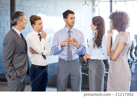 Business team interacting in office Business team interacting in office 21217892
