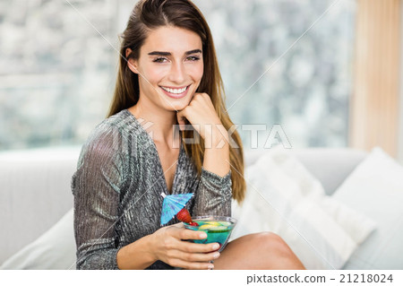 Portrait of beautiful woman having mocktail 21218024