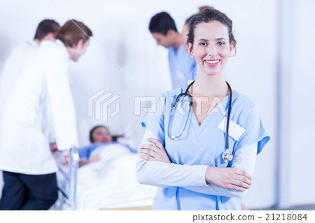 Portrait of female doctors smiling at camera Portrait of female doctors smiling at camera 21218084