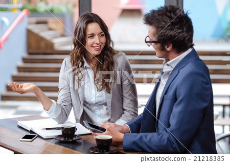 Smiling people talking 21218385