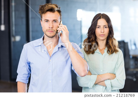 Confident executive talking on phone Confident executive talking on phone 21218769