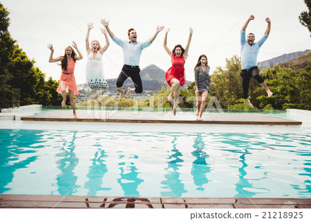 Young friends having fun at swimming pool 21218925