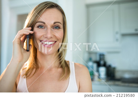 Pretty blonde woman on the phone 21219580