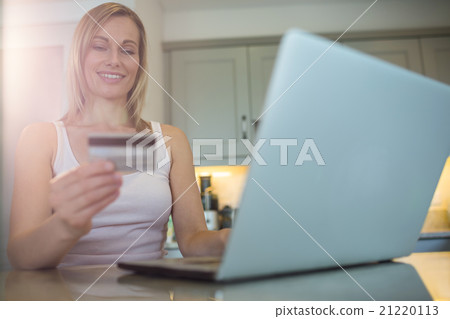 Pretty blonde woman ordering online 21220113