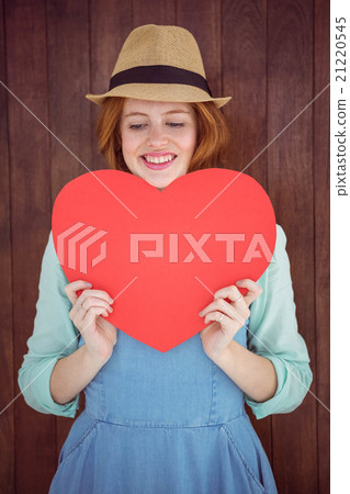 Pretty hipster holding heart 21220545