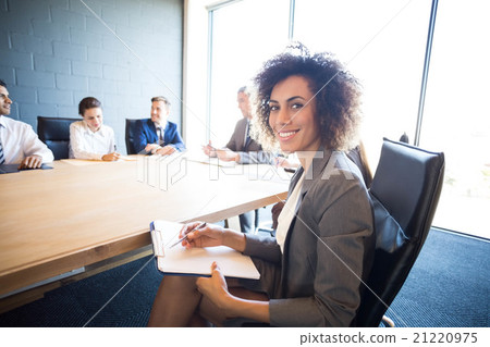 Business people discussing in conference meeting Business people discussing in conference meeting 21220975