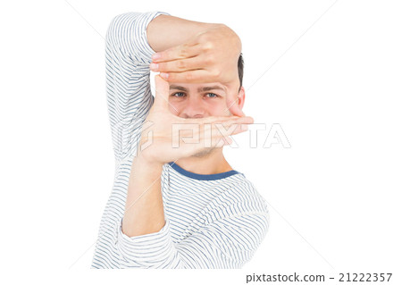Man looking at camera and gesturing 21222357