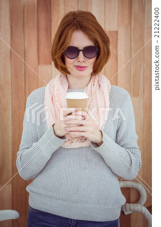 Red haired hipster drinking coffee Red haired hipster drinking coffee 21222400
