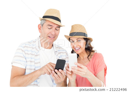 Happy couple using smartphone 21222496