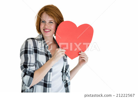 Fashion hipster holding a red heart shape 21222567