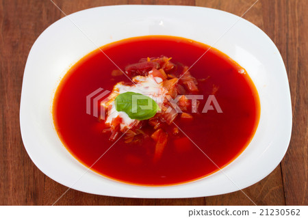 beet soup in white plate 21230562