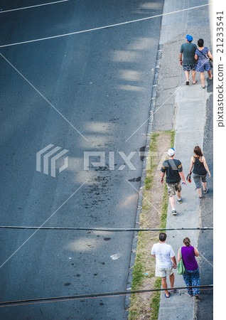 Couples walking on the sidewalk 21233541