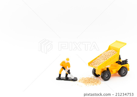 Dump truck and workers to lift baggage: dump truck unloading & worker 21234753