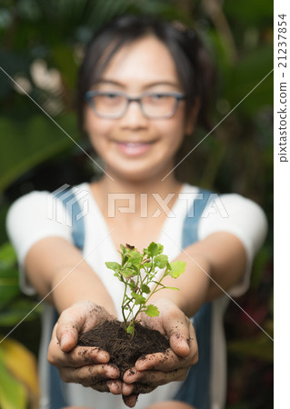 Woman Holding Tree Woman Holding Tree 21237854