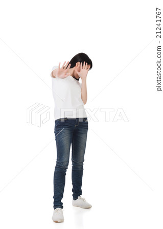 woman protect or hide her face 21241767