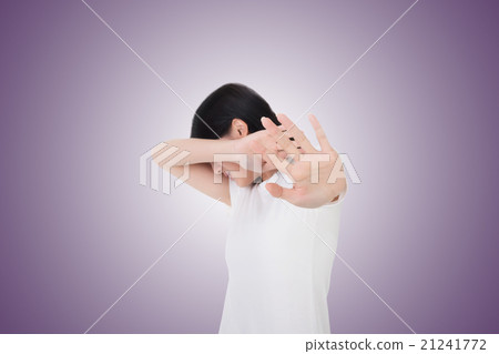 woman protect or hide her face 21241772