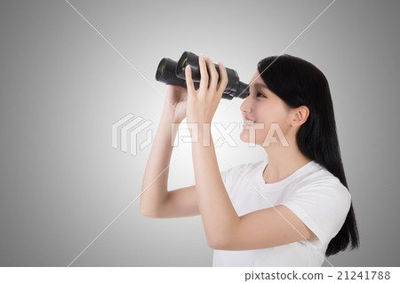 woman using binoculars woman using binoculars 21241788