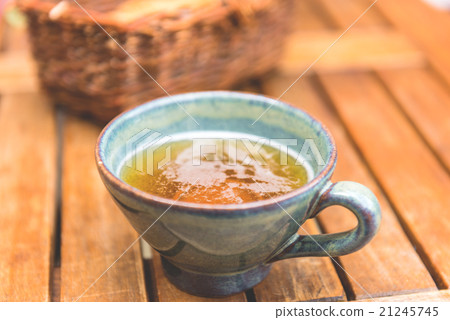 Norman apple cider in a typical ceramic cup Norman apple cider in a typical ceramic cup 21245745