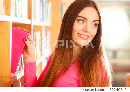 Girl student in college library Girl student in college library 21246741