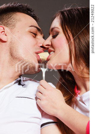 young couple eating banana fruit together 21249822