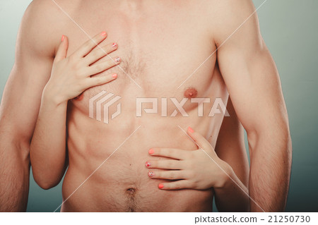 Sexy couple. Woman hands embracing naked man. 21250730
