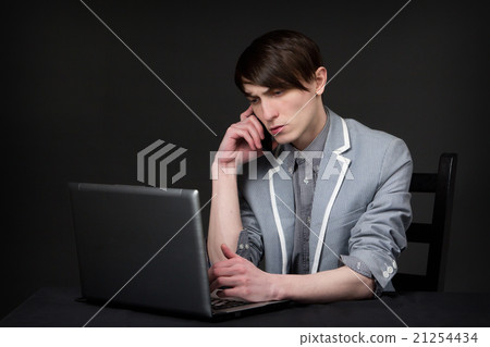 Young guy talking on the phone Young guy talking on the phone 21254434