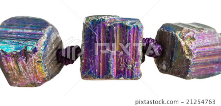 beads from rainbow pyrite gem stones close up 21254763