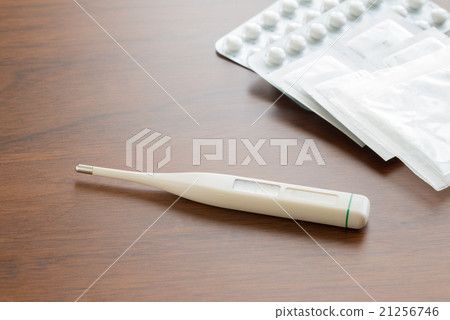 Thermometer and medicine 21256746